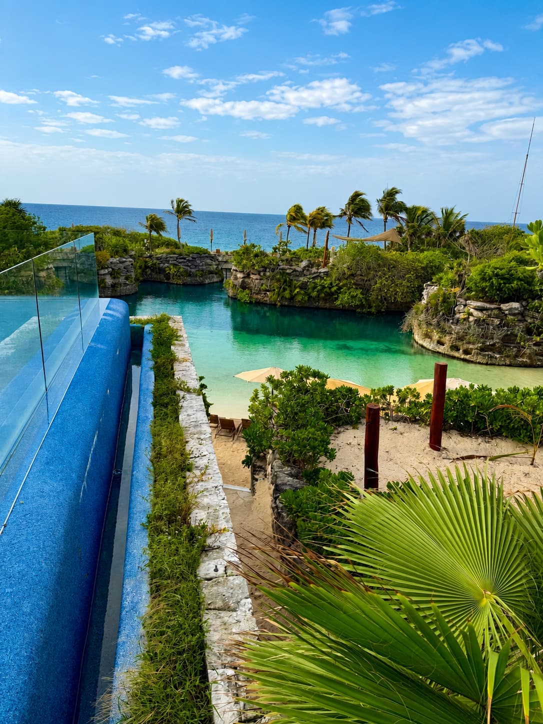 The river inlet meeting the sea at Hotel Xcaret Mexico, where resort days happen between park days